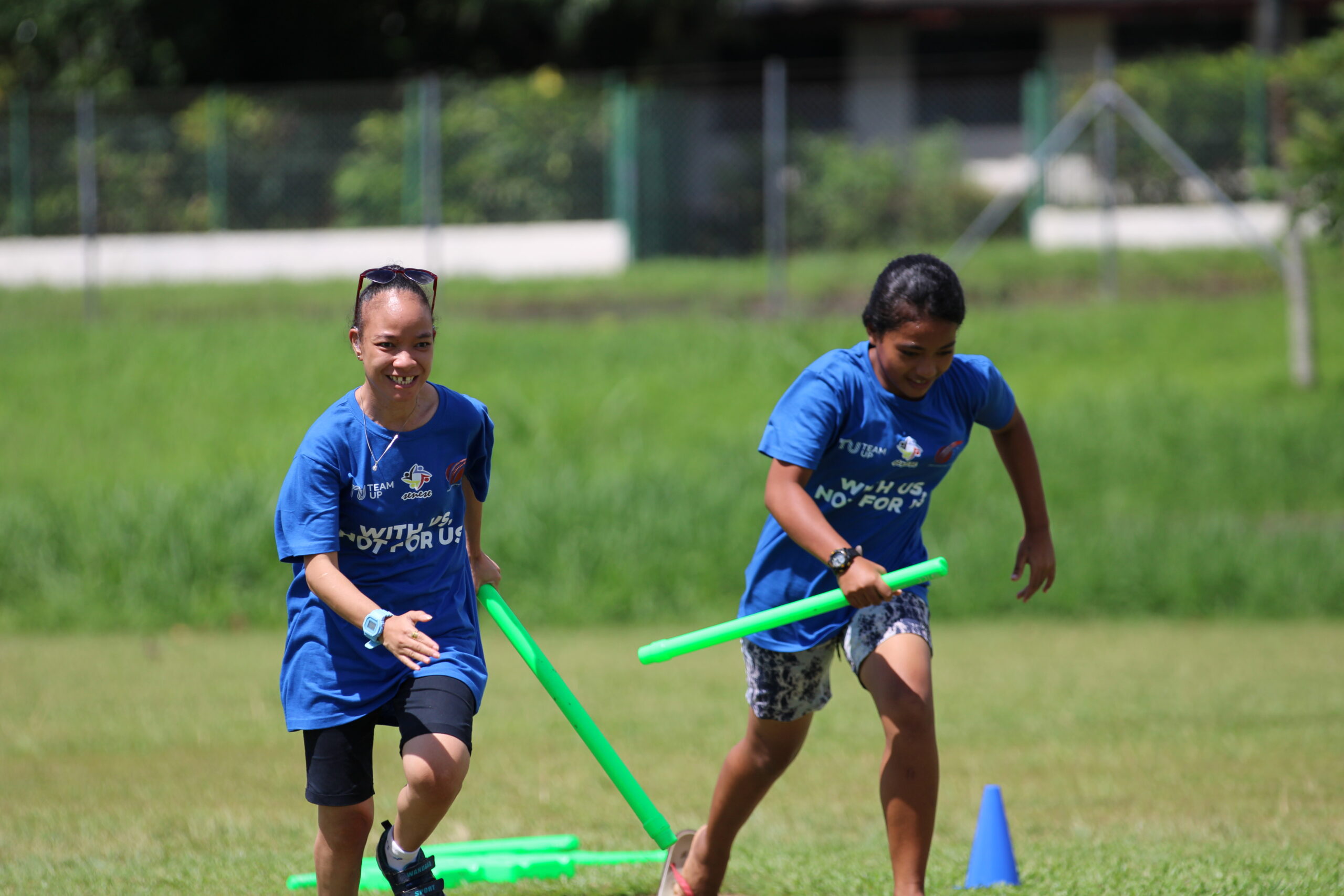 Samoan Boy in Red T-Shirt Batting